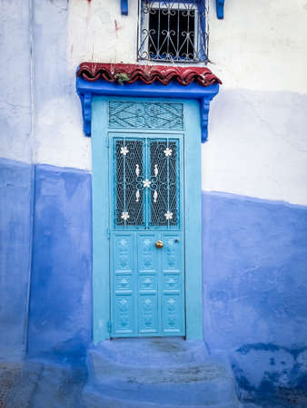 Blue door in Chefchaouen Medina - Moroccoの写真素材