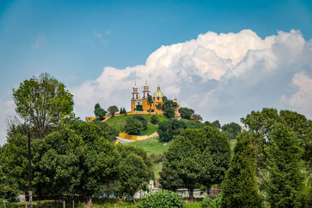 Church of Our Lady of Remedies at the top of pyramid Cholula - Cholula, Puebla, Mexicoの写真素材