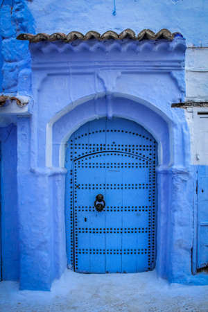Blue door in Chefchaouen Medina - Moroccoの写真素材