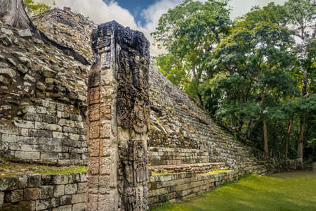 Pyramid stairs and Stella Carved in Mayan Ruins - Copan Archaeological Site, Honduras
