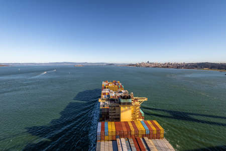Container Cargo Ship entering San Francisco Bay - San Francisco, California, USAの写真素材
