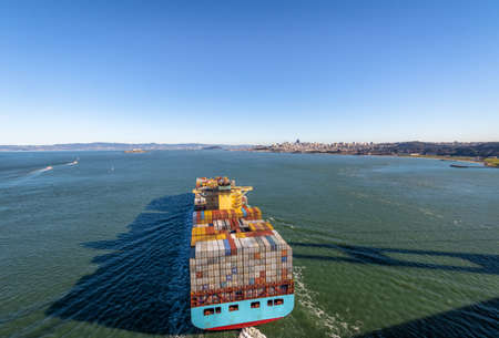 Container Cargo Ship entering San Francisco Bay - San Francisco, California, USAの写真素材