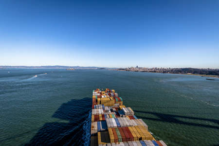 Container Cargo Ship entering San Francisco Bay - San Francisco, California, USAの写真素材