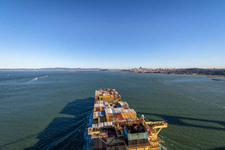 Container Cargo Ship entering San Francisco Bay - San Francisco, California, USAの写真素材
