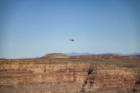 Helicopter flying over Grand Canyon West Rim - Arizona, USAの写真素材