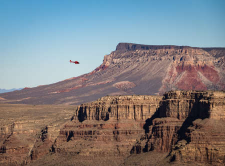 Helicopter flying over Grand Canyon West Rim - Arizona, USAの写真素材