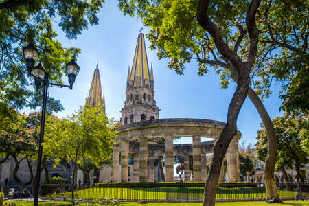 Rotonda de los Jalisciences Illustrious and Cathedral - Guadalajara, Jalisco, Mexicoの写真素材