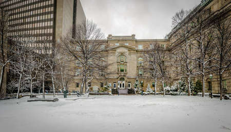 Old Buildings in downtown with snow - Montreal, Quebec, Canadaの写真素材