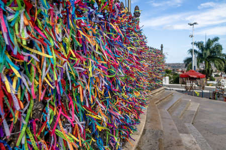 Colorful ribbons of Lord of Bonfim in front of Nosso Senhor do Bonfim Church - Salvador, Bahia, Brazilの写真素材