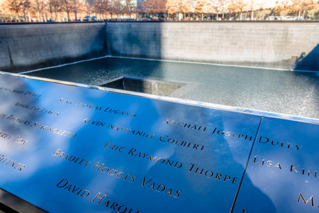 Names of the victims of 9/11 Memorial at Ground Zero World Trade Center - New York City, USAのeditorial素材