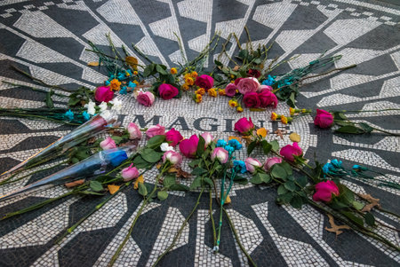The Imagine mosaic with flowers on day of John Lennon death at Strawberry Fields in Central Park, Manhattan - New York, USAのeditorial素材