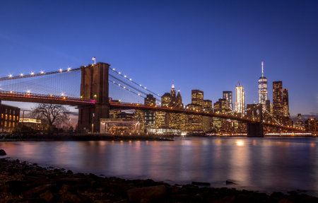 Brooklyn Bridge and Manhattan skyline at sunset - New York, USAの写真素材