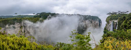 Panoramic view of Itaimbezinho Canyon with fog at Aparados da Serra National Park - Cambara do Sul, Rio Grande do Sul, Brazilの写真素材