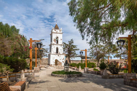 Bell Tower of the Church (Campanario de San Lucas) at Toconao Village Main Square - Toconao, Atacama Desert, Chile.の写真素材