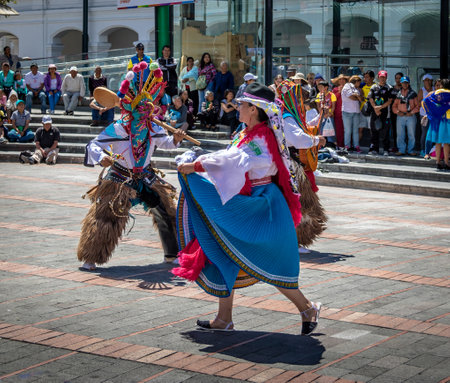 Group in local costume performing ecuadorian traditional dance - Quito, Ecuadorのeditorial素材