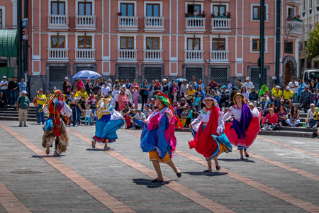 Group in local costume performing ecuadorian traditional dance - Quito, Ecuadorのeditorial素材