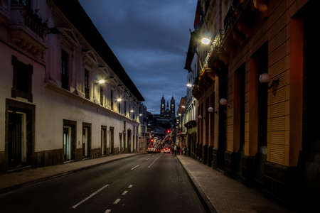 Street of Quito and Basilica del Voto Nacional at night - Quito, Ecuadorの写真素材