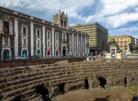 Ruins of the Roman Amphitheater at the Stesicoro Square - Catania, Sicily, Italyのeditorial素材
