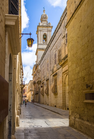 Old Narrow Street of Mdina with Carmelite Church Bell Tower - Mdina, Maltaのeditorial素材