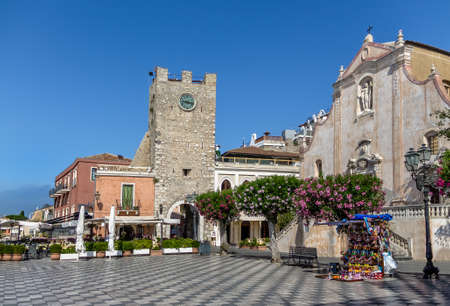 Taormina main square (Piazza IX Aprile) with San Giuseppe Church and the Clock Tower - Taormina, Sicily, Italyの写真素材