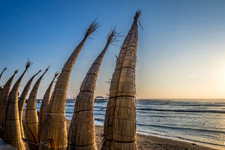 Huanchaco Beach and the traditional reed boats (caballitos de totora) - Trujillo, Peruの写真素材