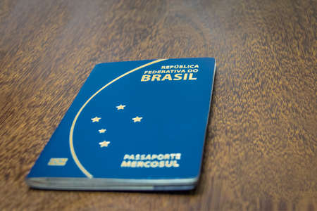 Brazilian passport on wooden backgroundの写真素材
