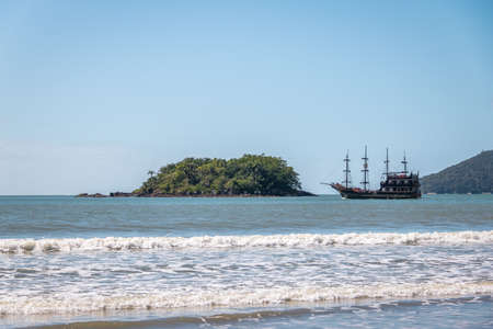 Ilha das Cabras Island and Touristic Pirate Ship - Balneario Camboriu, Santa Catarina, Brazilの写真素材