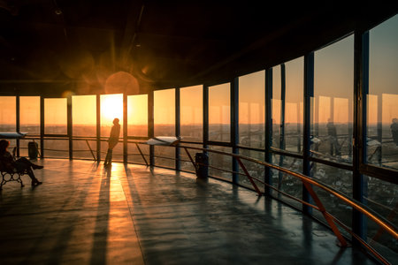 People watching the sunset over Curitiba city at Curitiba's Panoramic Tower - Curitiba, Parana, Brazilのeditorial素材