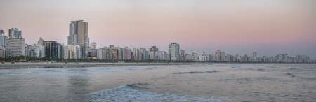 Santos Beach and city skyline at sunset - Santos, Sao Paulo, Brazilの写真素材