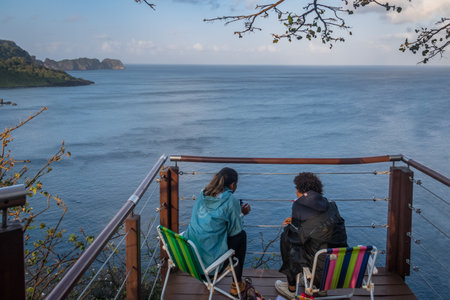 People of Project Spinner Dolphin Project monitoring the animals at Dolphins Bay - Fernando de Noronha, Pernambuco, Brazilのeditorial素材