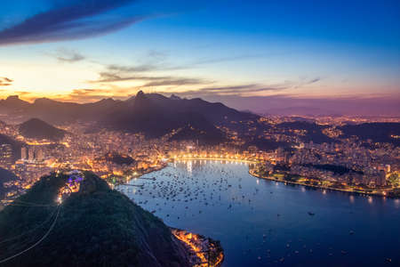 Aerial view of Rio de Janeiro at night with Urca and Corcovado mountain and Guanabara Bay - Rio de Janeiro, Brazilの写真素材