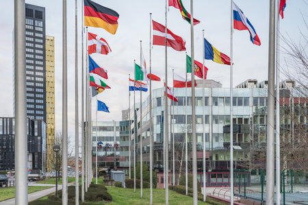 Flags in front of the European Union Parliament Secretariat - Konrad Adenauer Building at Kirchberg...