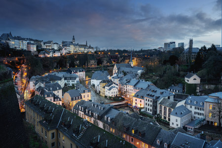 Luxembourg city skyline at night - Aerial view of The Grund with St Michaels Church on background - Luxembourg City, Luxembourgのeditorial素材
