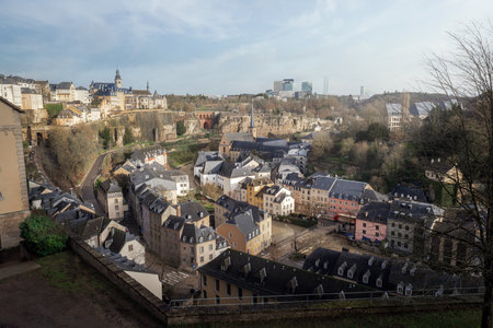 Luxembourg city skyline - Aerial view of The Grund at night with St Michaels Church on background - Luxembourg City, Luxembourgのeditorial素材