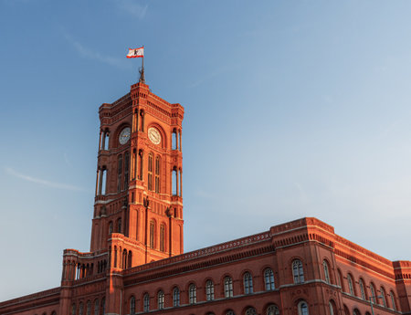 Berlin Town Hall (Rotes Rathaus) and Berlin Flag - Berlin, Germanyのeditorial素材