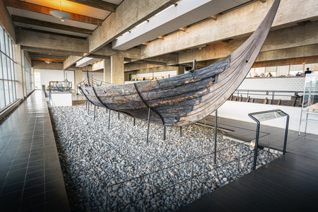 Roskilde, Denmark - Jun 25, 2019: Viking Ship Skuldelev 3 in the Viking Ship Museum Interior - Roskilde, Denmarkのeditorial素材