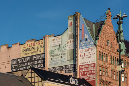 Malmo, Sweden - Jun 23, 2019: Vintage advertising from around 1900 in the side of Lejonet Pharmacy...