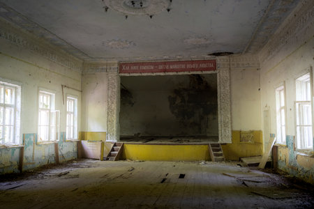 Chernobyl, Ukraine - Aug 06, 2019: Palace of Culture - Text says: Long live communism - The bright future of all humanity - Zalissya Village, Chernobyl Exclusion Zone, Ukraineのeditorial素材