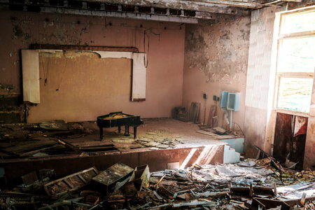 Chernobyl, Ukraine - Aug 07, 2019: Auditorium of Pripyat Music School and Concert Hall - Pripyat, Chernobyl Exclusion Zone, Ukraineのeditorial素材