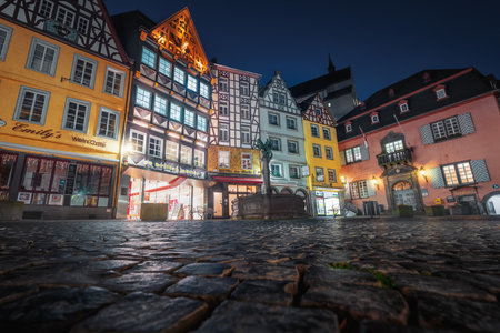 Cochem, Germany - Jan 21, 2020: Market Square (Marktplatz), St Martin Fountain (Martinsbrunnen) and Cochem Town Hall (Rathaus) at night - Cochem, Rhineland-Palatinate, Germanyのeditorial素材