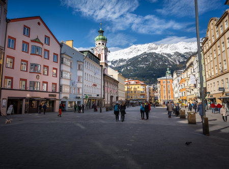 Innsbruck, Austria - Nov 14, 2019: Street view of Maria-Theresien-Strasse with Alps Mountains on background - Innsbruck, Tyrol, Austriaのeditorial素材