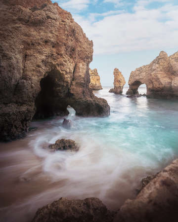 Ponta da Piedade Rock Formations and turquoise sea - Long Exposure shot - Lagos, Algarve, Portugalの写真素材