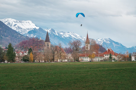Paragliding at Interlaken Hohematte Park - Interlaken, Switzerlandの写真素材