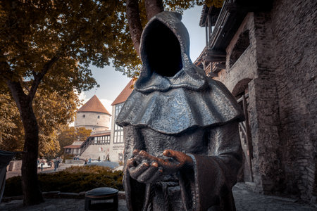 Tallinn, Estonia - Jul 08, 2019: Faceless Monks Sculpture named Three at Danish Kings Garden - Ambrosius the Waiting Monk - art by Aivar Simsom and Paul Mand in 2011 - Tallinn, Estoniaのeditorial素材