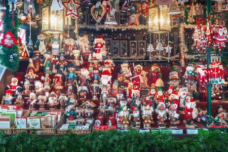 Nuremberg, Germany - Dec 09, 2019: Wooden toys and xmas decorations at Christmas Market Stall - Nuremberg, Bavaria, Germanyのeditorial素材