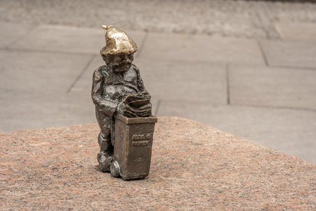 Wroclaw, Poland - Aug 21, 2019: Recycler dwarf (Recyklinek) - since 2005 hundreds of wroclaw dwarf figurines appeared in the city - Wroclaw, Polandのeditorial素材