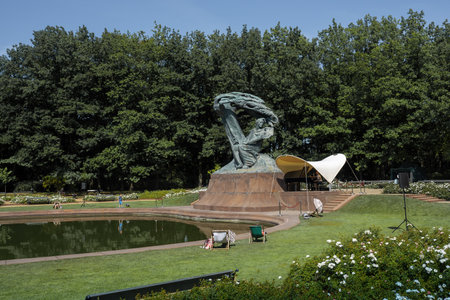 Warsaw, Poland - Aug 25, 2019: Chopin Monument at Lazienki Park - designed by Waclaw Szymanowski and erected in 1926, replaced by a replica in 1958 - Warsaw, Polandのeditorial素材