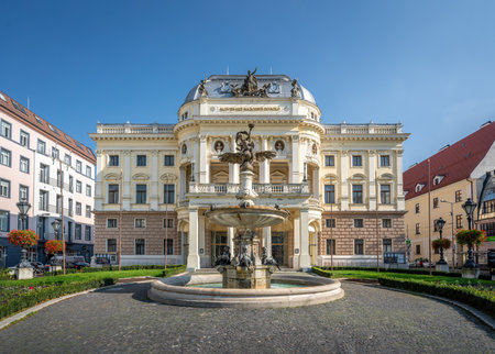 Bratislava, Slovakia - Oct 14, 2019: Slovak National Theater Historical Building and Ganymedes Fountain - Bratislava, Slovakiaのeditorial素材