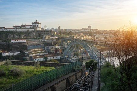 Dom Luis I Bridge and Monastery of Serra do Pilar at sunset - Porto, Portugalの写真素材