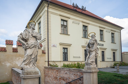 Brno, Czechia - Oct 6, 2019: Diocesan Museum with St. Peter and Paul statues - Brno, Czech Republic
